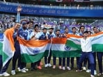 Indian players celebrate after winning the Men's Gold Medal cricket match against Afghanistan at the 19th Asian Games, in Hangzhou