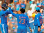 India's Kuldeep Yadav celebrates with teammate KL Rahul after the wicket of Australia's batter Glenn Maxwell. India's Kuldeep Yadav celebrates with teammate KL Rahul after the wicket of Australia's batter Glenn Maxwell.