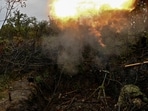 Russia-Ukraine War: A Ukrainian serviceman fires a mortar toward Russian troops at a position in a front line, amid Russia's attack on Ukraine.