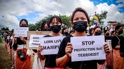 Khurai Pana Naha Sing (Youth of Khurai Pana) holding placards take part in a silent protest rally in Manipur. (ANI file) Khurai Pana Naha Sing (Youth of Khurai Pana) holding placards take part in a silent protest rally in Manipur. (ANI file)