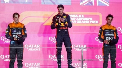 McLaren's Australian driver Oscar Piastri, (L) Red Bull Racing's Dutch driver Max Verstappen, (C) and McLaren's British driver Lando Norris celebrate on the podium following the Qatari Formula One Grand Prix (AFP) McLaren's Australian driver Oscar Piastri, (L) Red Bull Racing's Dutch driver Max Verstappen, (C) and McLaren's British driver Lando Norris celebrate on the podium following the Qatari Formula One Grand Prix (AFP)