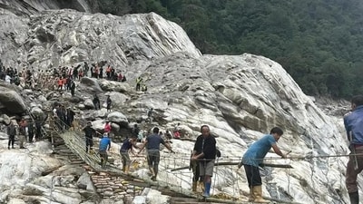 Search operations continued on Monday for the 105 people who are still missing after the cloudburst over Lhonak Lake in North Sikkim triggered a flash flood in the Teesta river basin. (HT Photo) Search operations continued on Monday for the 105 people who are still missing after the cloudburst over Lhonak Lake in North Sikkim triggered a flash flood in the Teesta river basin. (HT Photo)