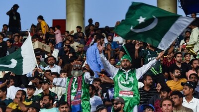 Pakistan's fans cheer during a match (AFP)