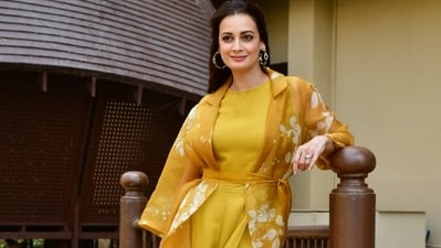 Dia Mirza looked lovely in a yellow dress with a matching floral shrug. She paired with it hoop earrings and orange heels as she joined her Dhak Dhak co-stars on Monday. Dia Mirza looked lovely in a yellow dress with a matching floral shrug. She paired with it hoop earrings and orange heels as she joined her Dhak Dhak co-stars on Monday. 