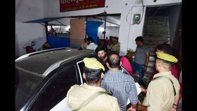 Gangster-politician slain Atiq Ahmed's sons Ehjam and his youngest brother police give custody to Atiq's sister Parveen Ahmed. (Amar Deep Sharma) Gangster-politician slain Atiq Ahmed's sons Ehjam and his youngest brother police give custody to Atiq's sister Parveen Ahmed. (Amar Deep Sharma)