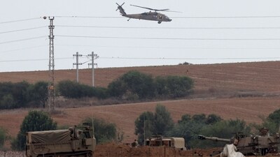 Israel-Palestine War: Israeli troop enforcements take position on the border with Gaza in southern Israel. (AFP) Israel-Palestine War: Israeli troop enforcements take position on the border with Gaza in southern Israel. (AFP)
