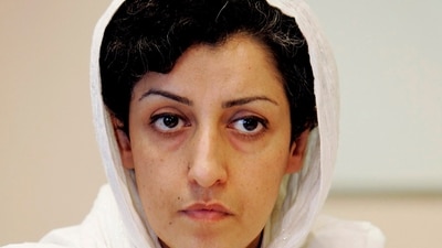 FILE - Iranian Narges Mohammadi, delegate of the Center for Human Rights Defenders, listens to a question during a press conference on the Assessment of the Human Rights Situation in Iran, at the U.N. headquarters in Geneva, Switzerland, on June 9, 2008. The Nobel Peace Prize has been awarded to Narges Mohammadi for fighting oppression of women in Iran. The chair of the Norwegian Nobel Committee announced the prize Friday, Oct. 6, 2023 in Oslo. (Magali Girardin/Keystone via AP, File) (AP) FILE - Iranian Narges Mohammadi, delegate of the Center for Human Rights Defenders, listens to a question during a press conference on the Assessment of the Human Rights Situation in Iran, at the U.N. headquarters in Geneva, Switzerland, on June 9, 2008. The Nobel Peace Prize has been awarded to Narges Mohammadi for fighting oppression of women in Iran. The chair of the Norwegian Nobel Committee announced the prize Friday, Oct. 6, 2023 in Oslo. (Magali Girardin/Keystone via AP, File) (AP)