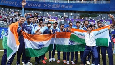 Indian players celebrate after winning the Men's Gold Medal cricket match against Afghanistan at the 19th Asian Games, in Hangzhou (PTI)