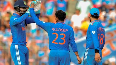 India's Kuldeep Yadav celebrates with teammate KL Rahul after the wicket of Australia's batter Glenn Maxwell. (PTI) India's Kuldeep Yadav celebrates with teammate KL Rahul after the wicket of Australia's batter Glenn Maxwell. (PTI)
