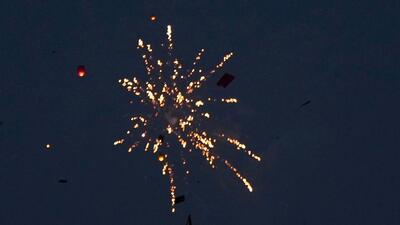 People burst firecrackers to celebrate the 77th Independence Day in New Delhi. (PTI) People burst firecrackers to celebrate the 77th Independence Day in New Delhi. (PTI)
