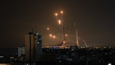 An Israeli missile launched from the Iron Dome defence missile system attempts to intercept a rocket, fired from the Gaza Strip. (AFP) An Israeli missile launched from the Iron Dome defence missile system attempts to intercept a rocket, fired from the Gaza Strip. (AFP)