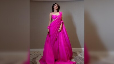 Samantha Prabhu's ensemble featured contemporary elements, including a bralette-style blouse and a floor-length cape that perfectly matched the saree.&nbsp; (Instagram/@samantharuthprabhu)