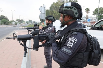 Israeli police stand guard in an area near the border with Gaza on October 9, 2023. (AFP) Israeli police stand guard in an area near the border with Gaza on October 9, 2023. (AFP)