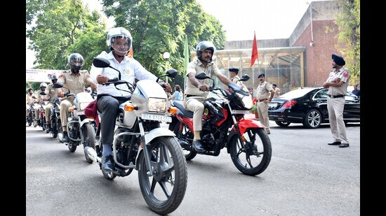 UT administrator Banwarilal Purohit flagged off 52 petrol-run bikes in Chandigarh on Monday. (KeshaVv)