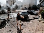 A building is ablaze following rocket attacks from the Gaza Strip, in Tel Aviv, Israel October 7.