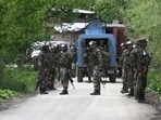 Soldiers during a cordon and search operation against terrorists in Shopian district 