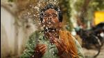 A labourer splashes water on his face to cool himself on a hot summer afternoon in Prayagraj, Uttar Pradesh. (AP File Photo)