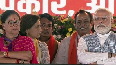 Prime Minister Narendra Modi with Bharatiya Janata Party (BJP) National Vice President Vasundhara Raje at a public meeting, (ANI) Prime Minister Narendra Modi with Bharatiya Janata Party (BJP) National Vice President Vasundhara Raje at a public meeting, (ANI)