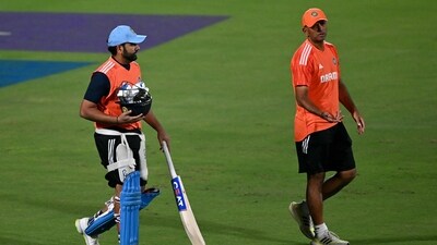 India's captain Rohit Sharma (L) and head coach Rahul Dravid speak during a practice session on the eve of the 2023 ICC Men's Cricket World Cup one-day international (ODI) match (AFP) India's captain Rohit Sharma (L) and head coach Rahul Dravid speak during a practice session on the eve of the 2023 ICC Men's Cricket World Cup one-day international (ODI) match (AFP)