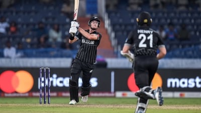 New Zealand's Mitchell Santner watches the ball after playing a shot during the 2023 ICC Men's Cricket World Cup one-day international (ODI) match between New Zealand and Netherlands (AFP) New Zealand's Mitchell Santner watches the ball after playing a shot during the 2023 ICC Men's Cricket World Cup one-day international (ODI) match between New Zealand and Netherlands (AFP)