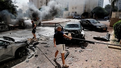 A building is ablaze following rocket attacks from the Gaza Strip, in Tel Aviv, Israel October 7. (Reuters)