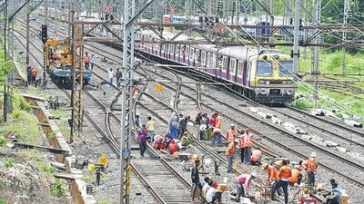 Mumbai suburban train services partially suspended. (Photo by Bhushan Koyande/HT Photo) Mumbai suburban train services partially suspended. (Photo by Bhushan Koyande/HT Photo)