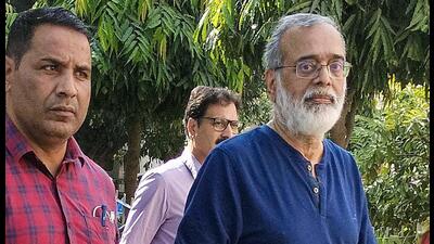 NewsClick founder Prabir Purkayastha being brought to the Patiala House Court by Delhi Police's special cell on Tuesday. (PTI) NewsClick founder Prabir Purkayastha being brought to the Patiala House Court by Delhi Police's special cell on Tuesday. (PTI)