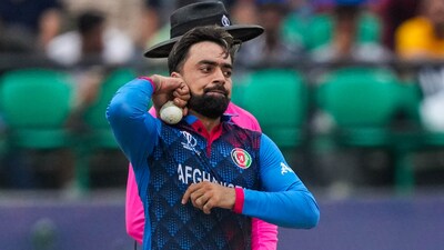 Rashid Khan bowls during the ICC Men's Cricket World Cup 2023 match between Bangladesh and Afghanistan (PTI) Rashid Khan bowls during the ICC Men's Cricket World Cup 2023 match between Bangladesh and Afghanistan (PTI)