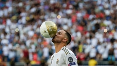 Belgium forward Eden Hazard kisses the ball during his official presentation after signing for Real Madrid at the Santiago Bernabeu (AP) Belgium forward Eden Hazard kisses the ball during his official presentation after signing for Real Madrid at the Santiago Bernabeu (AP)