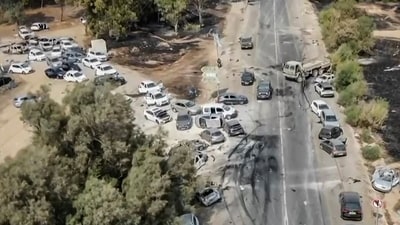 A grab taken from a UGC video posted on the Telegram channel "South First Responders" on October 9, 2023, shows the aftermath of an attack on the Supernova music Festival by Palestinian militants, near Kibbutz Reim in the Negev desert in southern Israel on October 8 (Photo by SOUTH FIRST RESPONDERS / AFP) (AFP) A grab taken from a UGC video posted on the Telegram channel "South First Responders" on October 9, 2023, shows the aftermath of an attack on the Supernova music Festival by Palestinian militants, near Kibbutz Reim in the Negev desert in southern Israel on October 8 (Photo by SOUTH FIRST RESPONDERS / AFP) (AFP)
