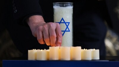 Candles are lit for a vigil at Temple Emanu-El of New York on October 09, 2023 in New York City (Photo by Michael M. Santiago / GETTY IMAGES NORTH AMERICA / Getty Images via AFP) (Getty Images via AFP) Candles are lit for a vigil at Temple Emanu-El of New York on October 09, 2023 in New York City (Photo by Michael M. Santiago / GETTY IMAGES NORTH AMERICA / Getty Images via AFP) (Getty Images via AFP)