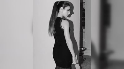 Fatima Sana Shaikh's midi dress is meticulously handcrafted, showcasing voluminous pleats and exquisite 'Garden of Eden' embroidery work. (Instagram/@fatimasanashaikh) Fatima Sana Shaikh's midi dress is meticulously handcrafted, showcasing voluminous pleats and exquisite 'Garden of Eden' embroidery work. (Instagram/@fatimasanashaikh)