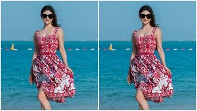 In the sleeveless short dress with corset patterns, Mouni posed on a beach and looked stunning as ever. (Instagram/@imouniroy) In the sleeveless short dress with corset patterns, Mouni posed on a beach and looked stunning as ever. (Instagram/@imouniroy)