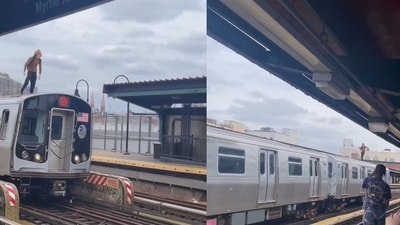 Man standing and running on the roof of a moving train in New York. (Instagram/@newyork__only) Man standing and running on the roof of a moving train in New York. (Instagram/@newyork__only)