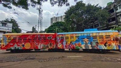 The outer walls of the first bogie feature hand-painted artwork paying tribute to 'Kumartuli,' the traditional potters' neighborhood in North Kolkata renowned for sculpting Durga idols. The artwork also includes representations of the 'Sindoor Khela' and 'Dhunuchi' dances. (ANI) The outer walls of the first bogie feature hand-painted artwork paying tribute to 'Kumartuli,' the traditional potters' neighborhood in North Kolkata renowned for sculpting Durga idols. The artwork also includes representations of the 'Sindoor Khela' and 'Dhunuchi' dances. (ANI)