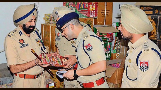 Commissioner of police Mandeep Singh Sidhu during a raid at a godown, where firecrackers were stored illegally, in Ludhiana. (HT PHOTO)