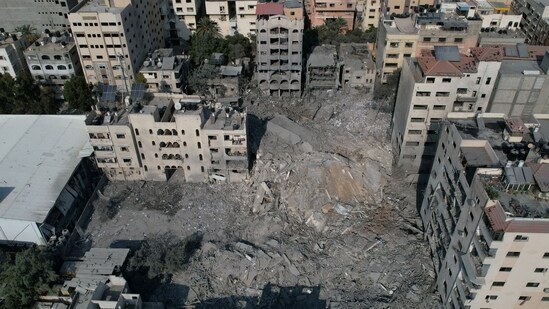 Israel-Palestine War: Destroyed buildings and residential towers following an Israeli missile attack in the Rimal district of Gaza City, Gaza. (Bloomberg)