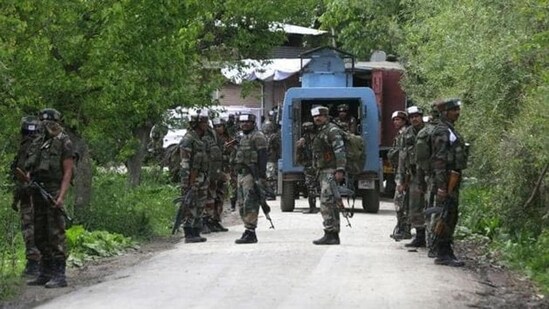 Soldiers during a cordon and search operation against terrorists in Shopian district