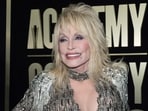 (FILES) US singer Dolly Parton attends the Academy of Country Music (ACM) Awards at Ford Center at the Star in Frisco, Texas, on May 11, 2023. Paul McCartney and Ringo Starr have joined Dolly Parton in recording a version of the Beatles classic "Let It Be" on the country legend's upcoming album. The track was released on on August 18, 2023 and will feature on the 77-year-old Parton's upcoming album "Rockstar." (Photo by SUZANNE CORDEIRO / AFP) (FILES) US singer Dolly Parton attends the Academy of Country Music (ACM) Awards at Ford Center at the Star in Frisco, Texas, on May 11, 2023. Paul McCartney and Ringo Starr have joined Dolly Parton in recording a version of the Beatles classic "Let It Be" on the country legend's upcoming album. The track was released on on August 18, 2023 and will feature on the 77-year-old Parton's upcoming album "Rockstar." (Photo by SUZANNE CORDEIRO / AFP)
