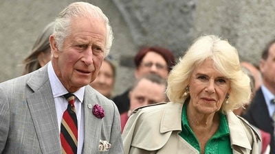 Britain's King Charles III and Britain's Queen Camilla react during a visit to Enniskillen Castle, on May 25, 2023 as part of a two-day visit to Northern Ireland. (Photo by Oliver McVeigh / POOL / AFP) (AFP)