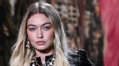 US Model Gigi Hadid walks the runway to present a creation by Chanel during the Paris Fashion Week Womenswear Spring/Summer 2024 at the Grand Palais Ephemere in Paris on October 3, 2023. (Photo by Bertrand GUAY / AFP) (AFP) US Model Gigi Hadid walks the runway to present a creation by Chanel during the Paris Fashion Week Womenswear Spring/Summer 2024 at the Grand Palais Ephemere in Paris on October 3, 2023. (Photo by Bertrand GUAY / AFP) (AFP)
