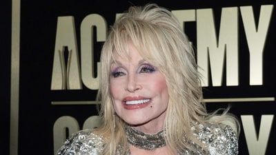 (FILES) US singer Dolly Parton attends the Academy of Country Music (ACM) Awards at Ford Center at the Star in Frisco, Texas, on May 11, 2023. Paul McCartney and Ringo Starr have joined Dolly Parton in recording a version of the Beatles classic "Let It Be" on the country legend's upcoming album. The track was released on on August 18, 2023 and will feature on the 77-year-old Parton's upcoming album "Rockstar." (Photo by SUZANNE CORDEIRO / AFP) (AFP) (FILES) US singer Dolly Parton attends the Academy of Country Music (ACM) Awards at Ford Center at the Star in Frisco, Texas, on May 11, 2023. Paul McCartney and Ringo Starr have joined Dolly Parton in recording a version of the Beatles classic "Let It Be" on the country legend's upcoming album. The track was released on on August 18, 2023 and will feature on the 77-year-old Parton's upcoming album "Rockstar." (Photo by SUZANNE CORDEIRO / AFP) (AFP)
