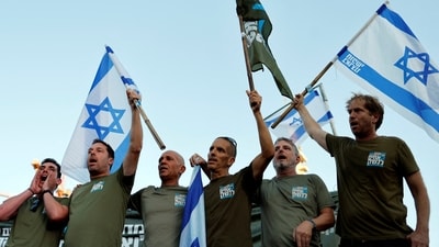 Israel's military has expanded its mobilization of reservists to 360,000. (File Photo / Reuters)