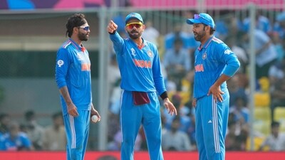 India's Ravindra Jadeja, Virat Kohli and Rohit Sharma sets the field during the ICC Men's Cricket World Cup match between India and Australia in Chennai (AP) India's Ravindra Jadeja, Virat Kohli and Rohit Sharma sets the field during the ICC Men's Cricket World Cup match between India and Australia in Chennai (AP)