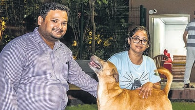 Mumbai, India - Oct. 11, 2023: Diya Saha and her husband Raju Doharey with the dogs at Runwal Forests, Kanjurmarg west in Mumbai, India, on Wednesday, October 11, 2023. (Photo by Satish Bate/ Hindustan Times) (Hindustan Times) Mumbai, India - Oct. 11, 2023: Diya Saha and her husband Raju Doharey with the dogs at Runwal Forests, Kanjurmarg west in Mumbai, India, on Wednesday, October 11, 2023. (Photo by Satish Bate/ Hindustan Times) (Hindustan Times)