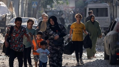 Israel-Palestine Latest: Palestinians evacuate a neighbourhood in Gaza City. (AFP) Israel-Palestine Latest: Palestinians evacuate a neighbourhood in Gaza City. (AFP)
