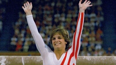 Mary Lou Retton reacts to applause after her performance at the Summer Olympics in Los Angeles on Aug. 3, 1984. Retton. 55, is in intensive care in a Texas hospital fighting a rare form of pneumonia, according to her daughter McKenna Kelley. (AP Photo/Suzanne Vlamis, File) (AP)