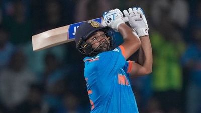 Rohit Sharma hits a six during the ICC Men's Cricket World Cup match between Afghanistan and India. (AP)