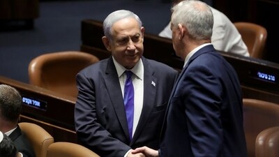 Israeli Prime Minister Benjamin Netanyahu, in tie, with Benny Gantz (Shutterstock)