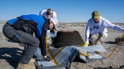 The capsule and its contents were initially examined in a "clean room" at the Utah Test and Training range near the landing site. (Reuters) The capsule and its contents were initially examined in a "clean room" at the Utah Test and Training range near the landing site. (Reuters)